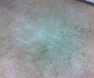dirty beige vinyl floor before professional cleaning