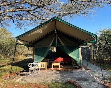Patio area of self catering safari tent at Albizia camp in Hluhluwe