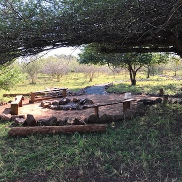 Firepit braai area for self catering glamping tents at Albizia camp in Hluhluwe