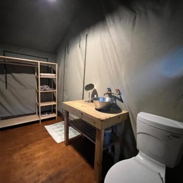 En suite bathroom at Albizia self catering tented camp in Hluhluwe