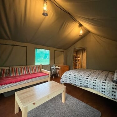 Safari tent bedroom at Albizia self catering tented camp in Hluhluwe