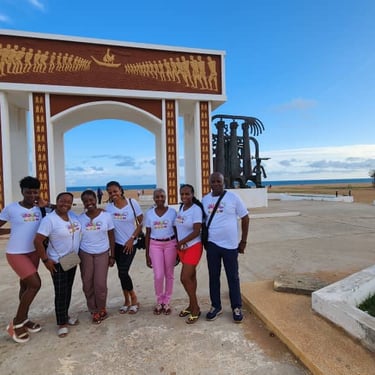 Haitian-American Visiting the Door of No Return in Benin with Dahomey African Tours