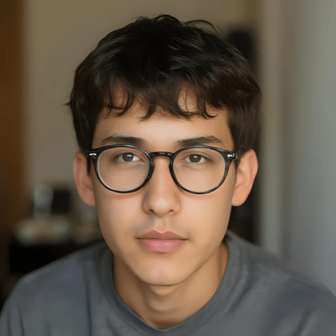 A portrait of a young boy wearing glasses