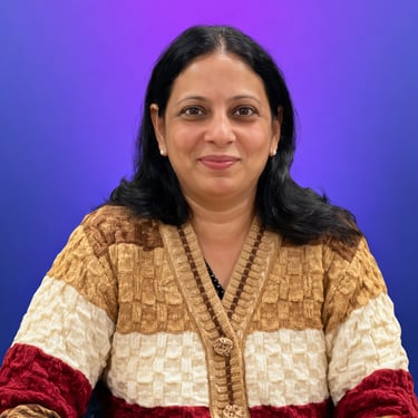 Professional portrait of a smiling woman wearing a textured knit cardigan against a solid purple background.