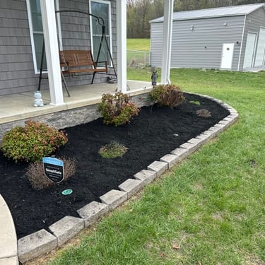 fresh mulch in landscaping bed