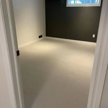 Ace low pile berber carpet installed wall-to-wall in basement bedroom of London Ontario residential home, durable and afforda