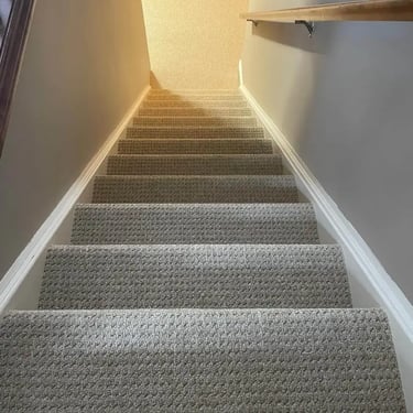 Margo low pile berber carpet installed wall-to-wall on residential stairs in London Ontario, durable and comfortable flooring