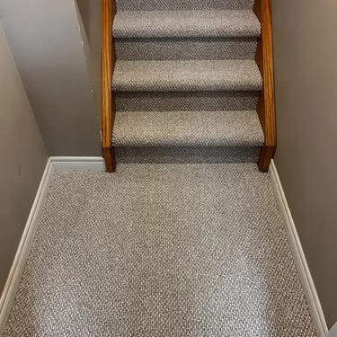 Bleached Wheat carpet from Interstellar installed on a staircase with landing in London, Ontario by Master Carpet
