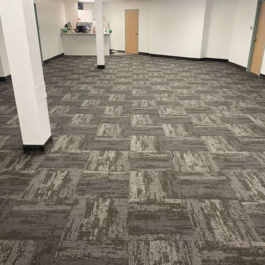 Irongate commercial carpet tile installed wall-to-wall in conference room of London Ontario office, durable and modern.