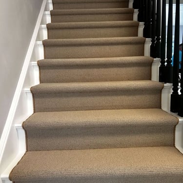 Custom wool runner installed on stairs – high-quality carpet adding warmth and style to London homes.