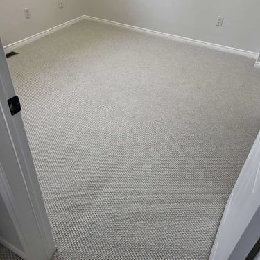 Gladiator Berber carpet installed in a white-themed bedroom – durable, looped texture ideal for high-traffic areas in London