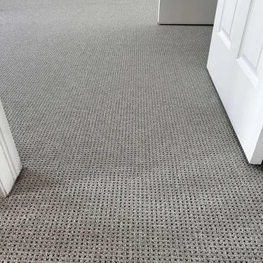 Grey Naples Berber carpet installed in London – durable and textured carpet for cozy living spaces.
