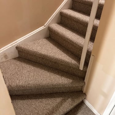 Thick berber carpet installed wall-to-wall on residential staircase – soft, durable stair flooring in London Ontario