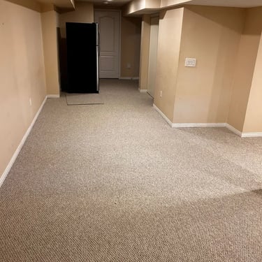 Thick berber carpet installed wall-to-wall in basement of residential home in Alymer Ontario, soft and durable flooring