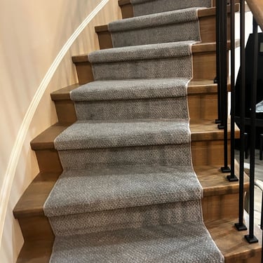Grey pattern carpet runner installed on hardwood stairs – stylish and durable stair runner in London Ontario home