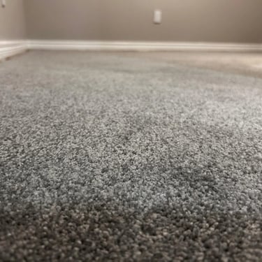 Grey plush carpet installed wall-to-wall in basement residential home in London Ontario, soft and warm carpet!