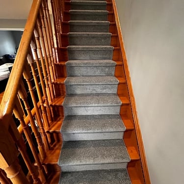 Grey plush carpet runner installed on residential stairs – soft and durable stair runner for London Ontario home