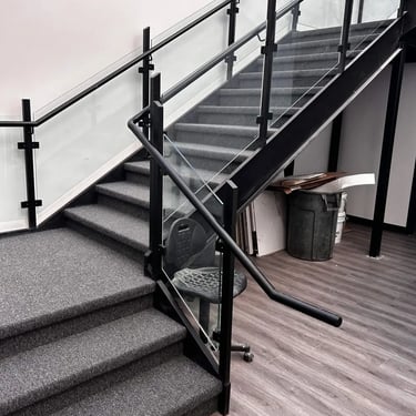 Academy commercial carpet installed on concrete stairs in London Ontario, durable and slip-resistant stair carpet.