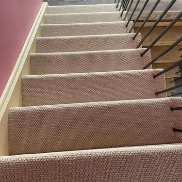 Beige Ace low pile berber carpet installed wall-to-wall on residential stairs in Byron London Ontario home