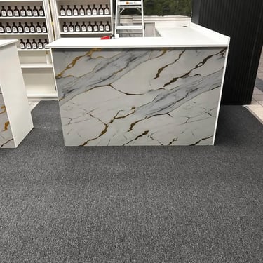 Academy 167 commercial carpet installed wall-to-wall in retail store at mall, durable and professional flooring in London