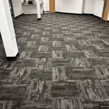 Dark grey design commercial carpet tile installed in conference room, London downtown office