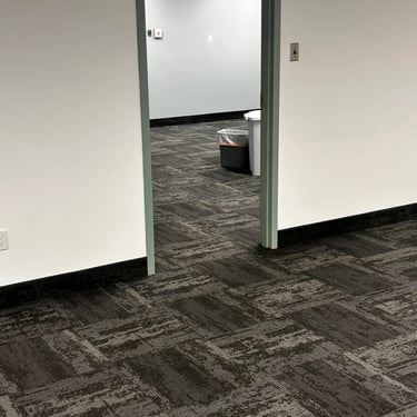 Commercial dark grey carpet tile in office hallway, durable flooring installed in White Oaks London Ontario