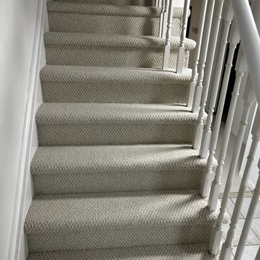 Gladiator berber carpet installed wall-to-wall on residential stairs in Westmount London Ontario home