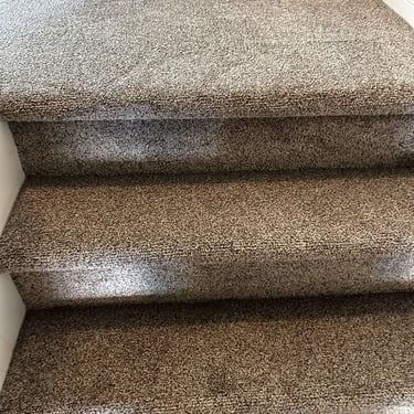 Melford 101 low pile carpet installed on staircase in Oakridge, London – durable and soft carpet ideal for stairs.