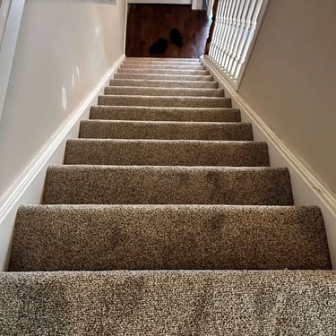 Melford 101 low pile carpet installed on full staircase in Oakridge, London – durable and stylish carpet for stairs.