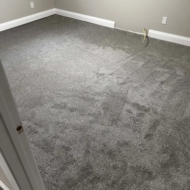 Melford 102 low pile carpet professionally installed in a basement bedroom in London – durable, soft, and perfect for bedroom