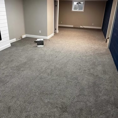 Melford 102 carpet installed in London living room – warm, comfortable, and stylish upgrade.