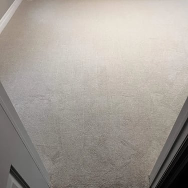 Beige Melford carpet installed in a bedroom – soft, durable carpet adding warmth and comfort to London homes.