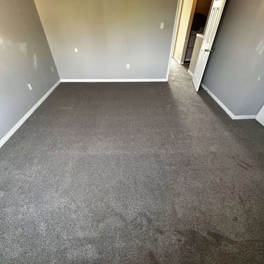 Alternate angle of Melford carpet installed in a bedroom with closet in Talbot, London – soft and durable carpet flooring!