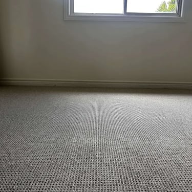 Close-up of Naples Berber carpet installed in a bedroom