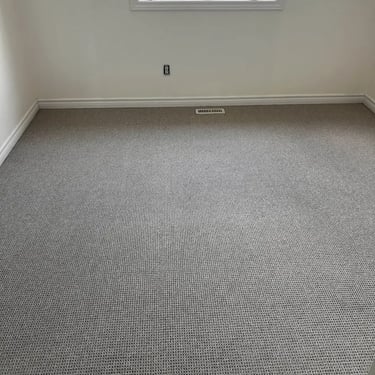 Naples Berber carpet installed in an upstairs bedroom in London – textured beige carpet providing a cozy and durable flooring