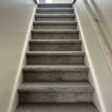 Melford low pile plush carpet installed wall-to-wall on basement stairs in London Ontario home, soft and durable flooring