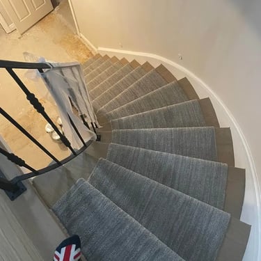 Wavy design carpet stair runner installed on hardwood stairs, custom-fit for safe and stylish stair coverage