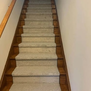 Macy grey plush carpet stair runner installed on residential stairs in London Ontario, soft and durable flooring