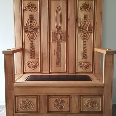 Handcrafted monks bench with mortise and tenon joints and highly detailed Celtic knot work carvings. Colorado Springs.