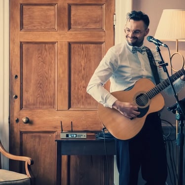 Joe Russell - solo acoustic guitar and vocal performance in Devon and Cornwall.