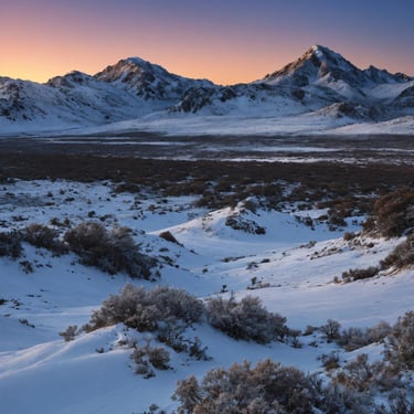 a mountain scene with a snow covered mountain range
