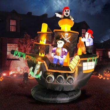 Inflatable pirate ghost ship at night.