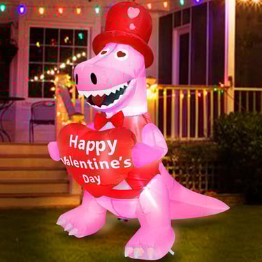 pink dinosaur holding Valentine's Day heart