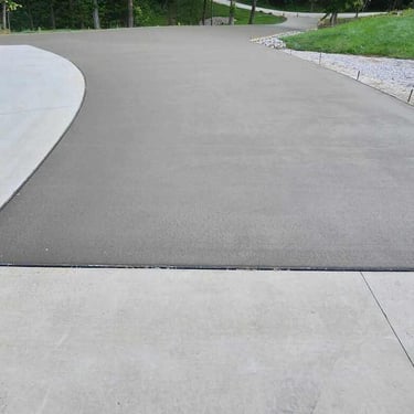 Everlasting Dark Black Concrete Driveway Curved