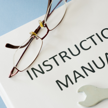 glasses on a instruction manual
