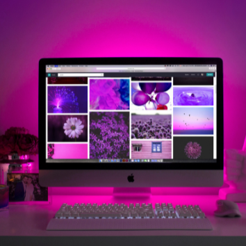 a computer monitor screen with a keyboard and mouse