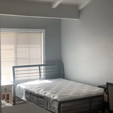 Private furnished student room with natural light at Malad House. Off-campus Boise State housing near BSU campus.