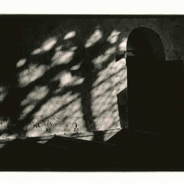 An abstract photography of a wall lit with a light in  1000-years old church in Duxford. Author: Slawek Dejneka