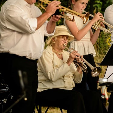 A group of three musicians play on trumpets during the concert. Author: Slawek Dejneka