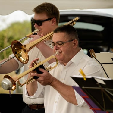 Flax on Sax, an open air concert in Duxford, and two musicians play on trumpets.. Author: Slawek Dejneka
